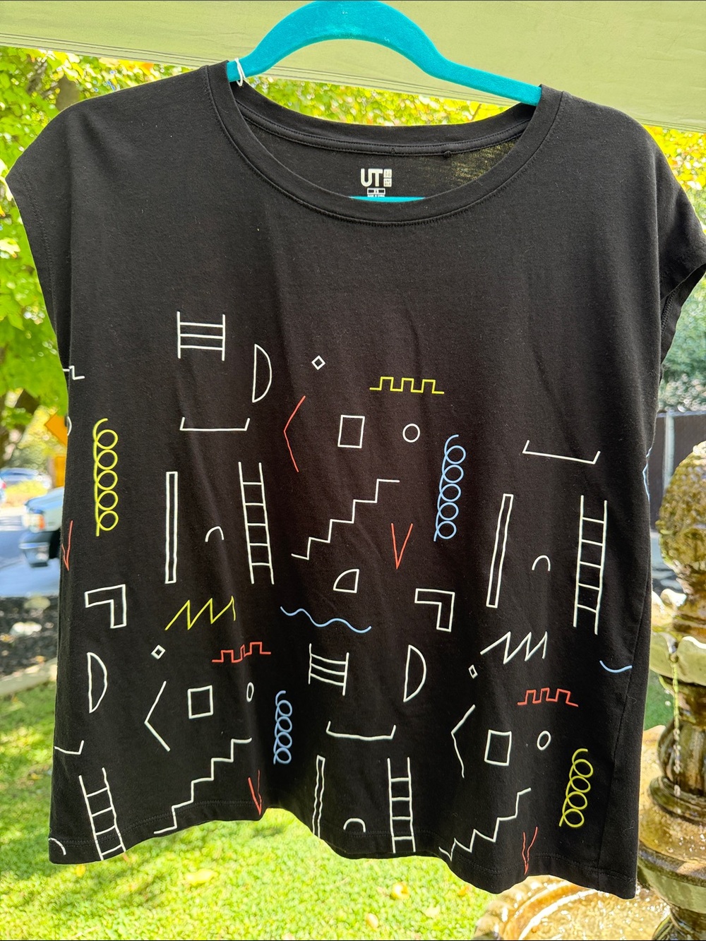 UT Black Short Sleeve Tee with Multicolor Geometric Motif